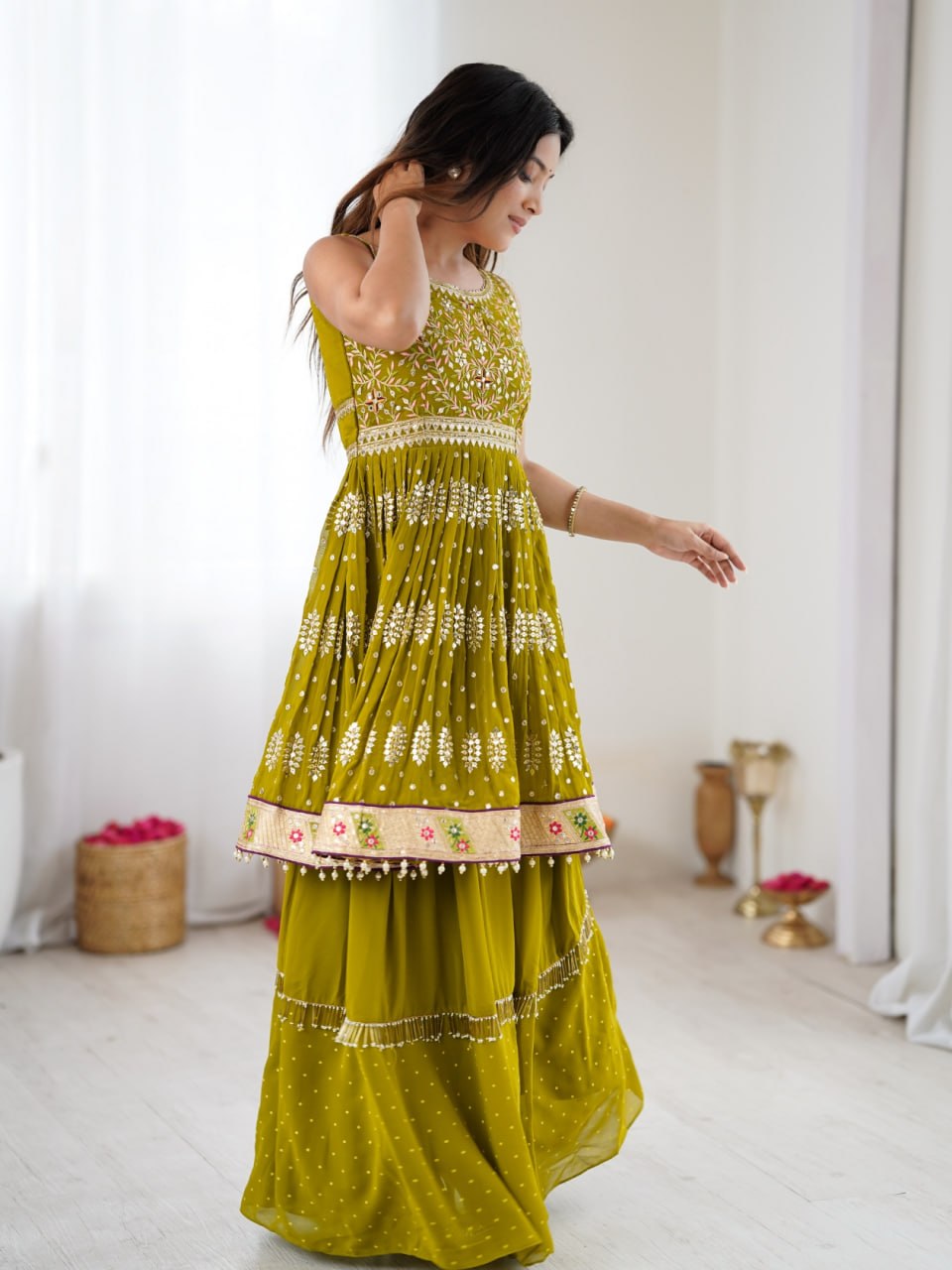 Embroidered mustard kurta lehenga set for festive wear